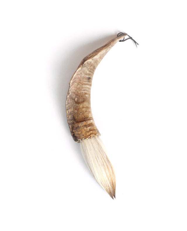 Buffalo horn with baby goat hair