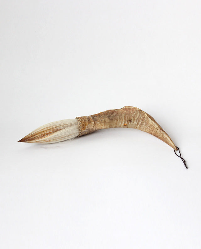 Buffalo horn with baby goat hair