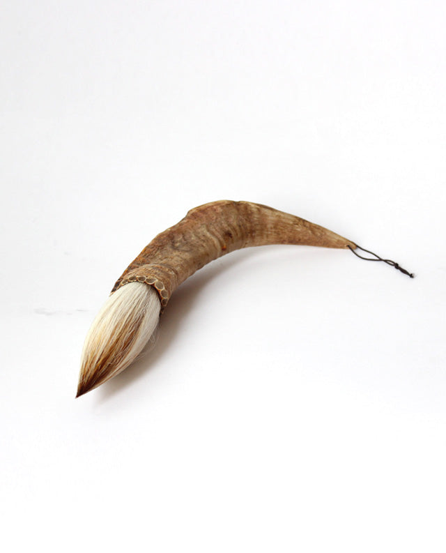 Buffalo horn with baby goat hair